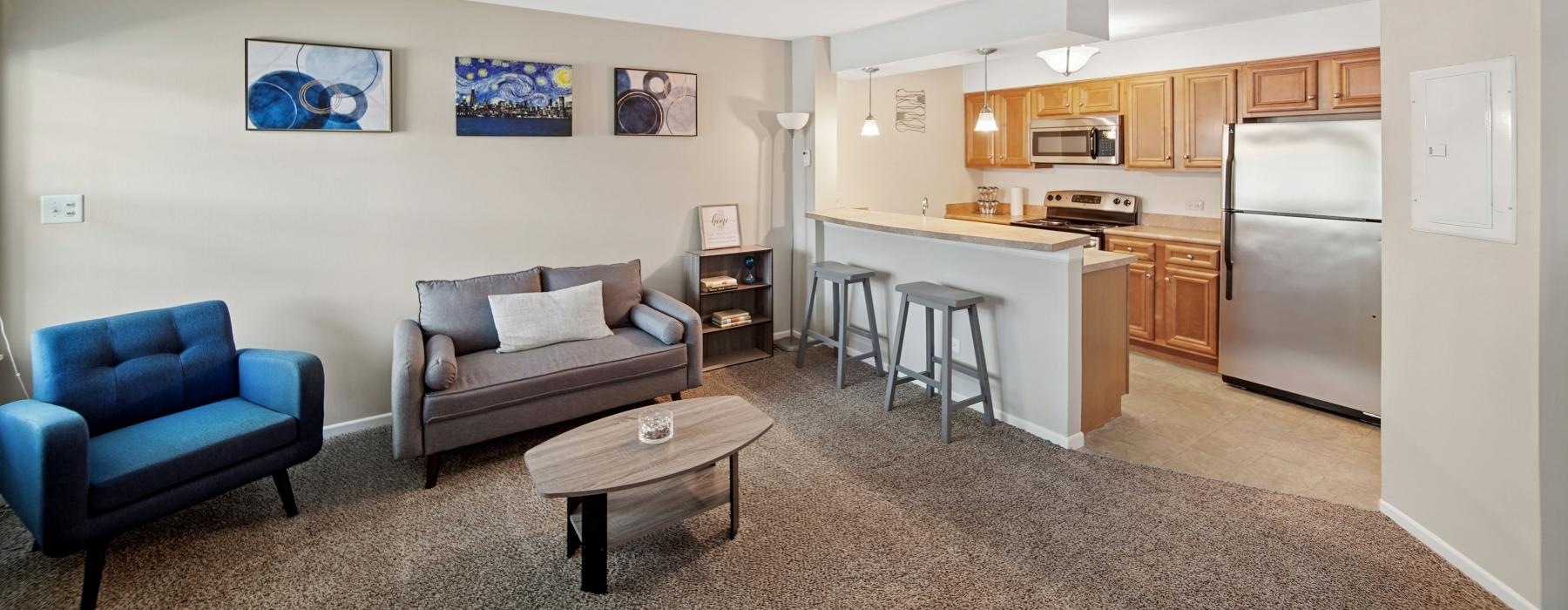 a living room with a couch and a table